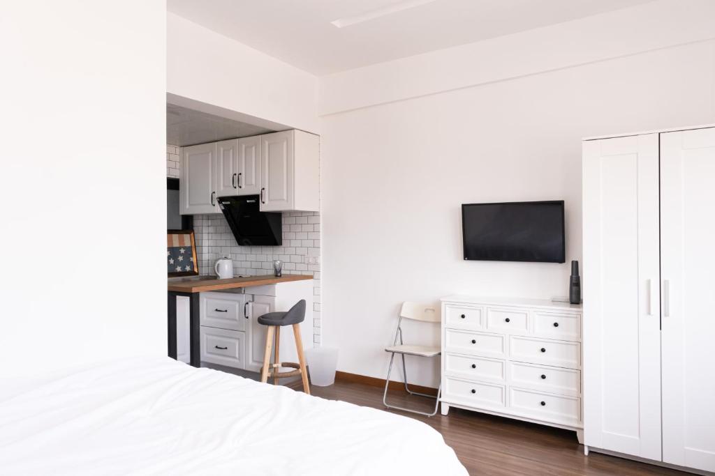 A kitchen or kitchenette at 1930 French Minimalist Apartment