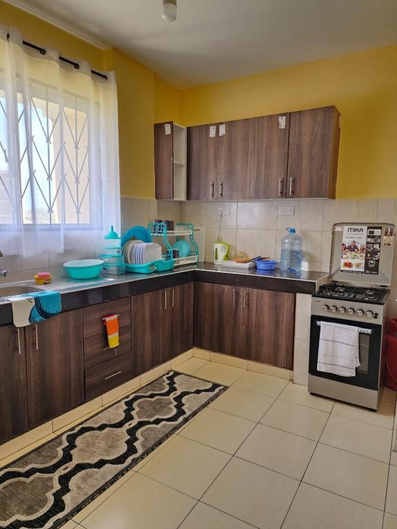 Virtuve vai virtuves zona naktsmītnē Airbnb Mombasa Bamburi