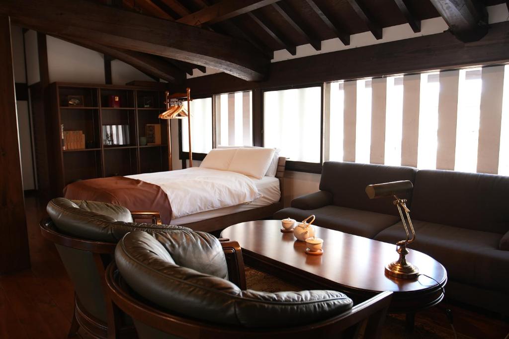 Cama ou camas em um quarto em KAMIYASHIKI Private Hotel - Self Check-in Only