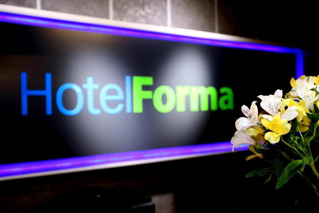 תעודה, פרס, שלט או מסמך אחר המוצג ב-Hotel Forma