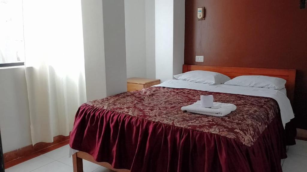 Кровать или кровати в номере hostal nazly