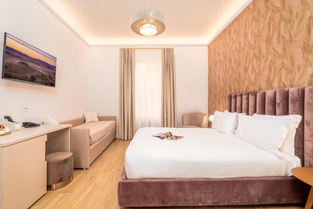 Ліжко або ліжка в номері Hotel Ginori Al Duomo