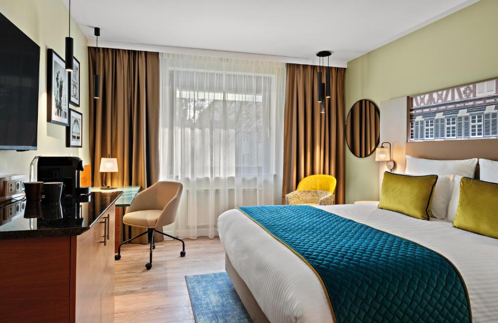 Gulta vai gultas numurā naktsmītnē Leonardo Hotel Esslingen