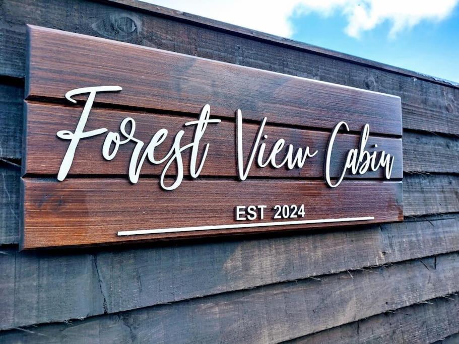 Сертификат, награда, табела или друг документ на показ в Forest View Cabin