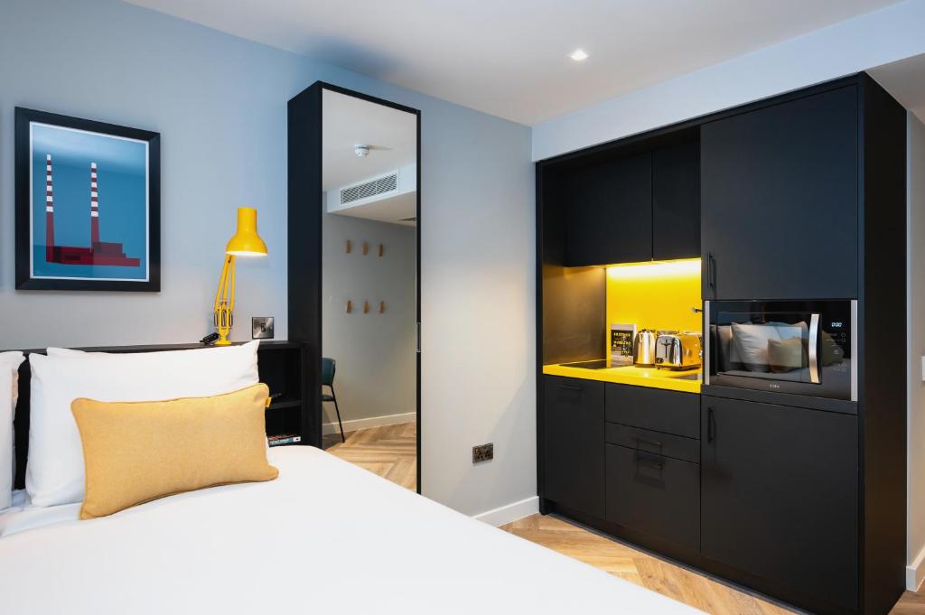 Säng eller sängar i ett rum på Staycity Aparthotels Dublin City Centre