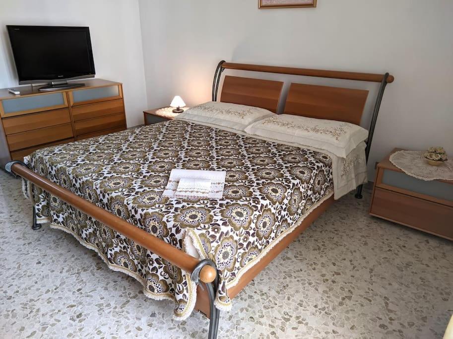 Una cama o camas en una habitación de Casa Vacanze Farinella