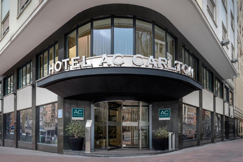 a hotel carillon building with a sign on it at AC Hotel Carlton Madrid by Marriott in Madrid