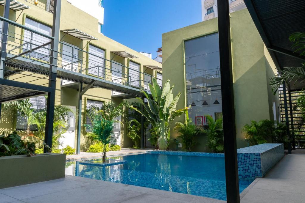 The swimming pool at or close to OASIS TROPICAL HOTEL