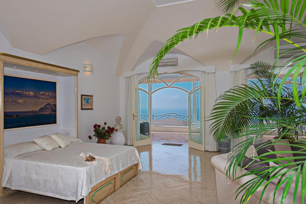 Lova arba lovos apgyvendinimo įstaigoje Villa Santa Chiara Positano Suites