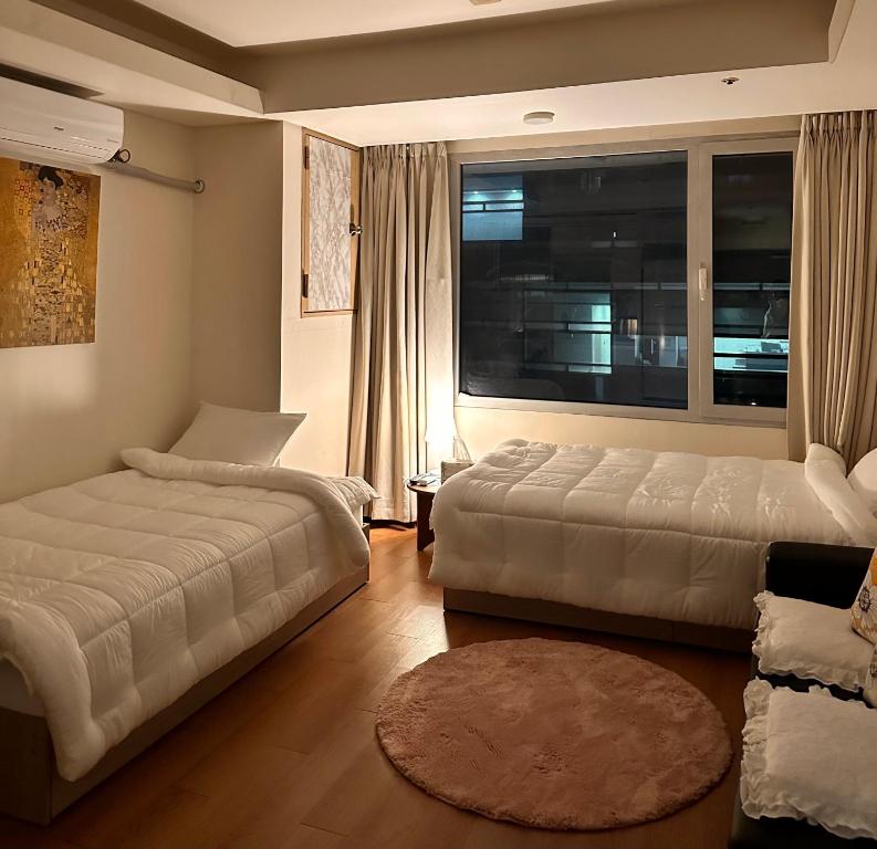 Vuode tai vuoteita majoituspaikassa #Gangnam Station 3m #Convenient Public Transport #Cozy Stay