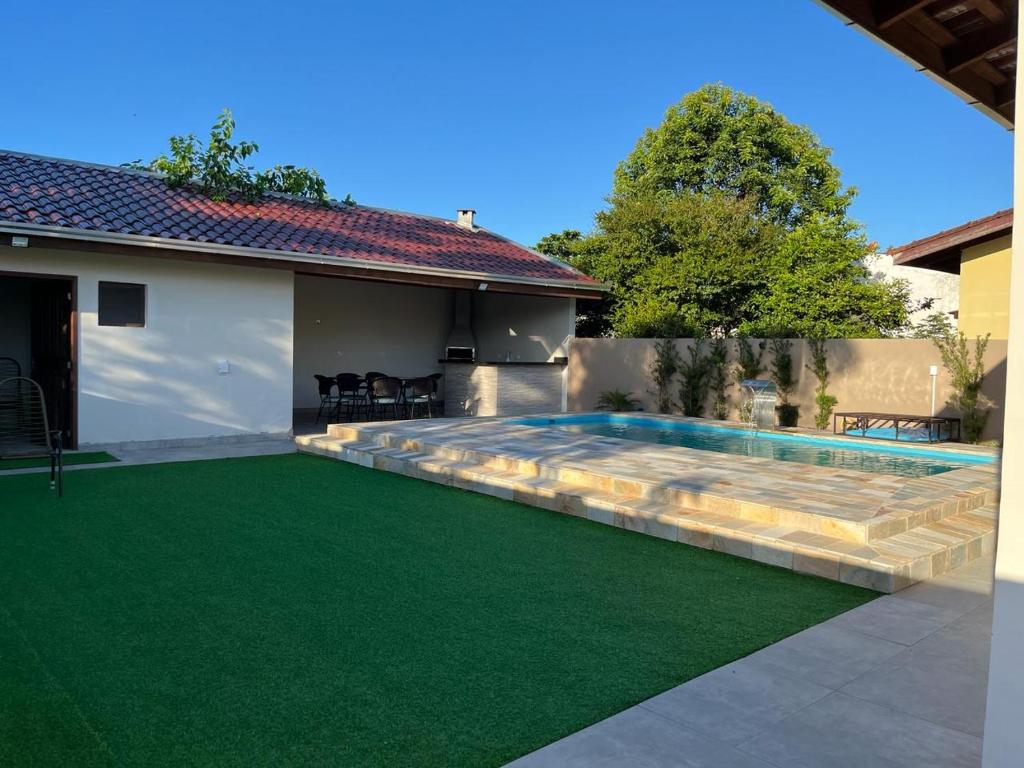 Sundlaugin á Com piscina. Casa para família. eða í nágrenninu