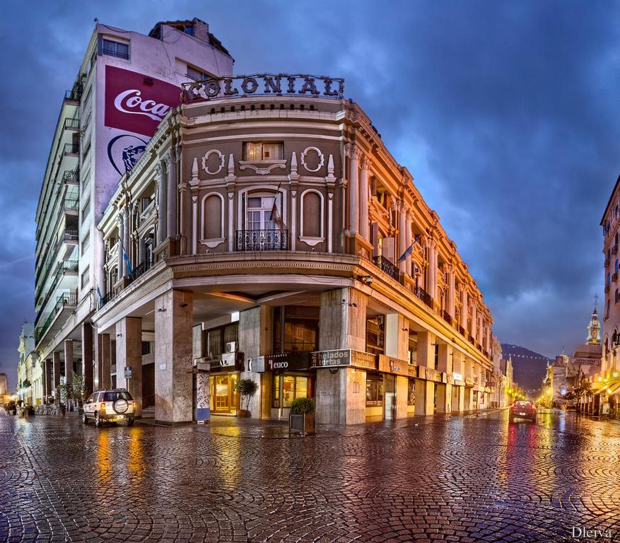 a building on a city street at night at Hotel Colonial Salta in Salta