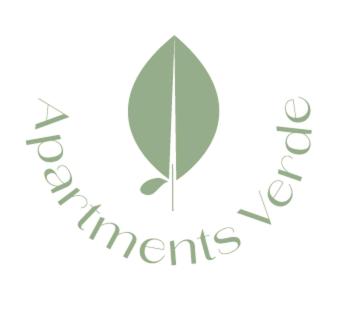 un logo vert avec les mots «prospérité» dans l'établissement Apartments Verde, à Grein