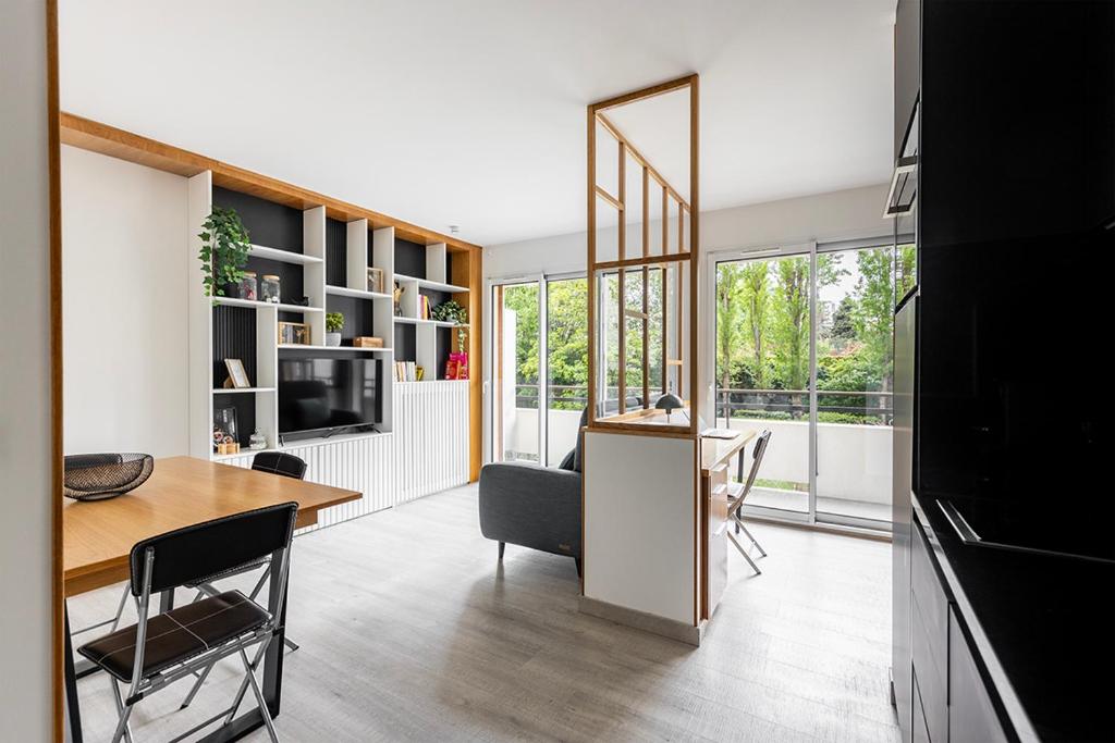 Atpūtas zona naktsmītnē Studio avec balcon, proche de Paris tout équipé