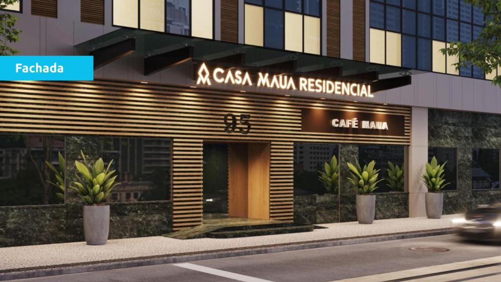 a casa miami restaurant with a car in front of it at Lobie Casa Mauá in Rio de Janeiro