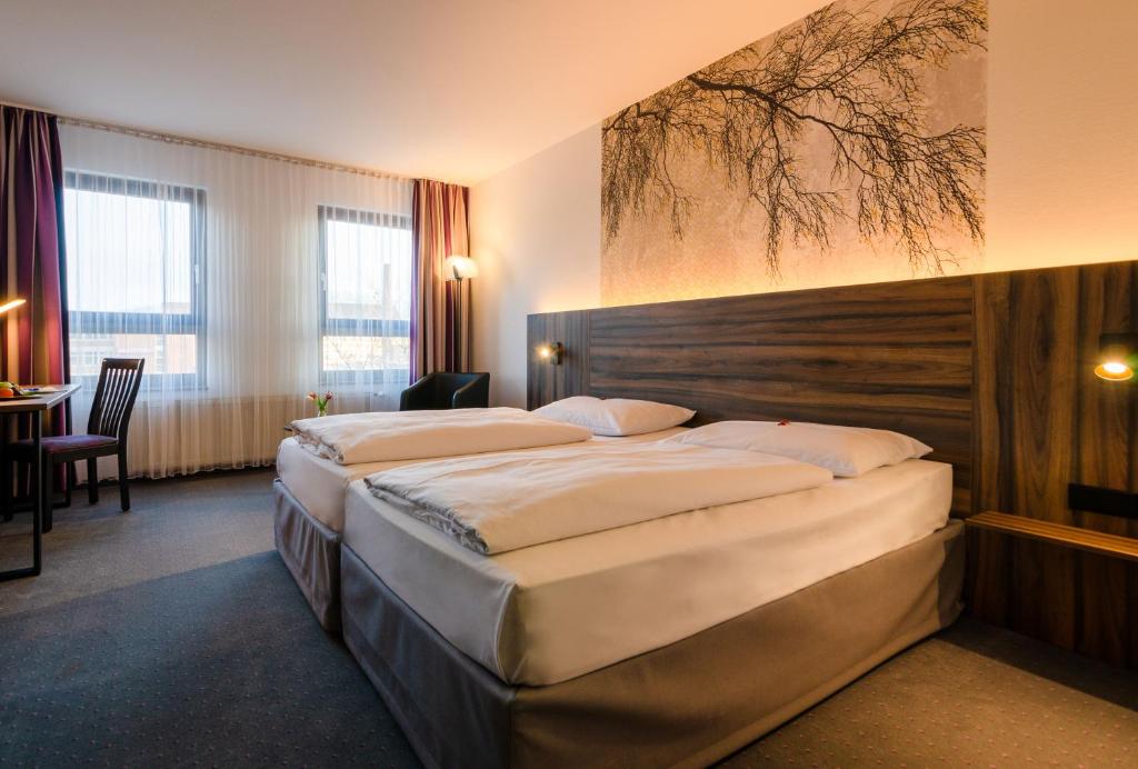 Lova arba lovos apgyvendinimo įstaigoje City Hotel Fortuna Reutlingen