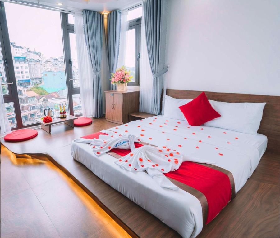 Le Tuan Minh Hotel tesisinde bir odada yatak veya yataklar