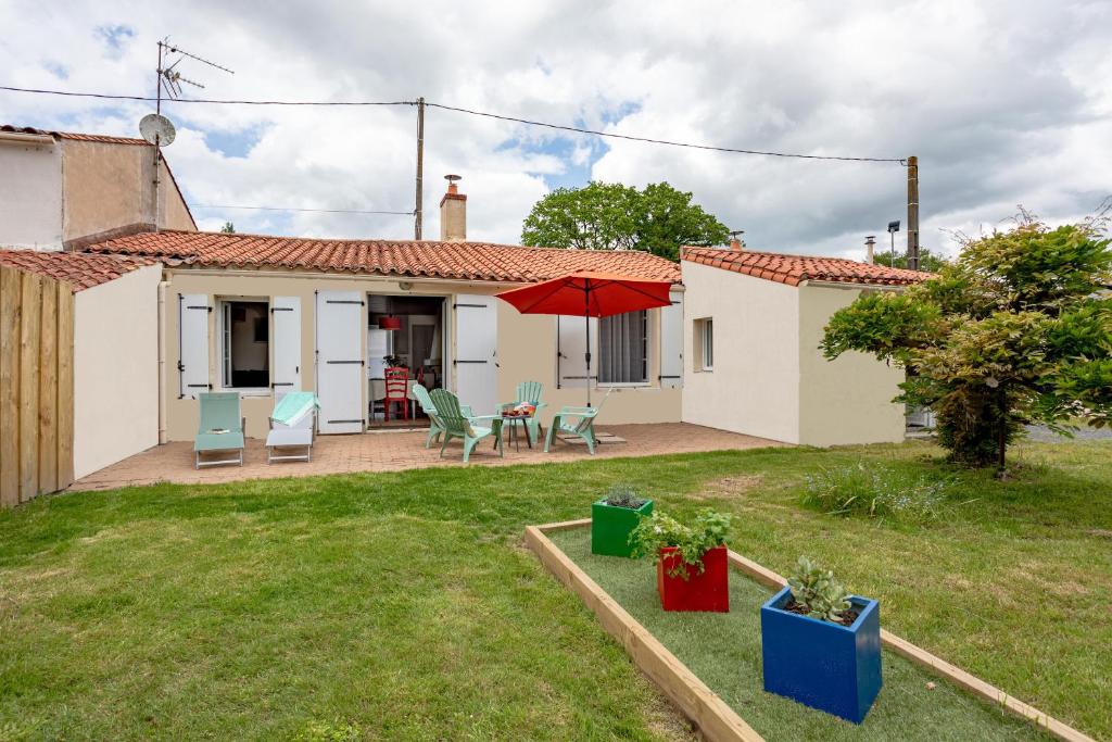 Taman di luar Maison calme terrasse et jardin