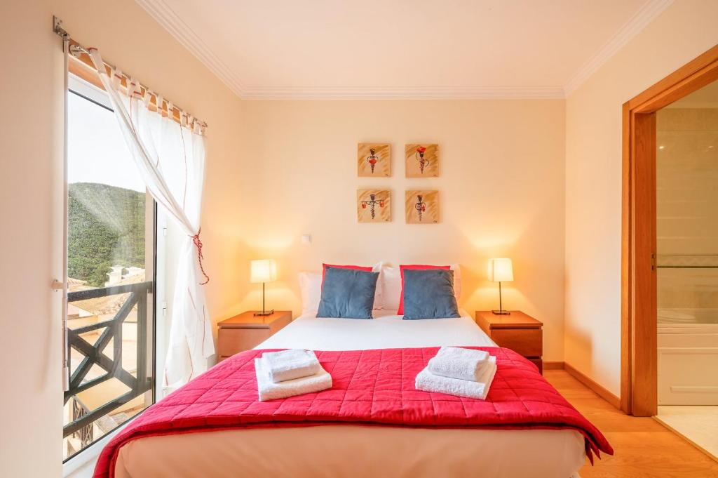 Una cama o camas en una habitación de GuestReady - Caravelas Getaway