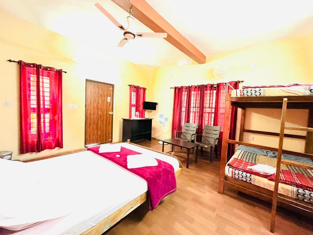 Vuode tai vuoteita majoituspaikassa Sahyadri Homestay wayanad