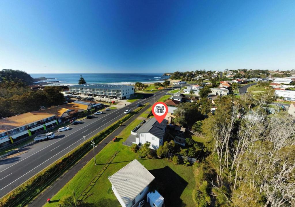 an aerial view of a town with a stop sign at Skyes Beach House - The entertainer - Pet Friendly in Malua Bay