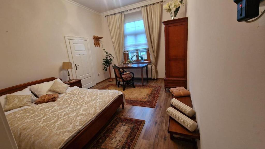 Ліжко або ліжка в номері Apartament na Zielonej