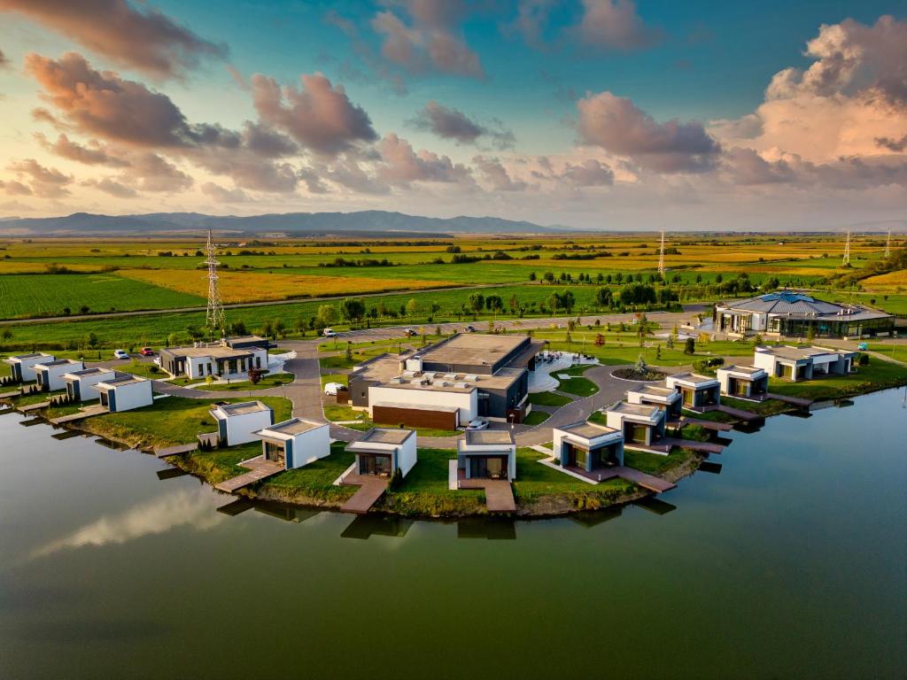 an aerial rendering of a resort on the water at Serenity Resort in Codlea