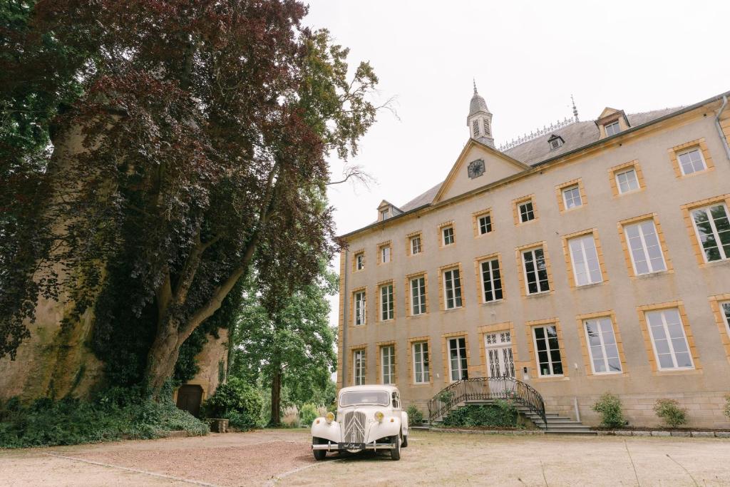 Сад в Hôtel Château Schengen