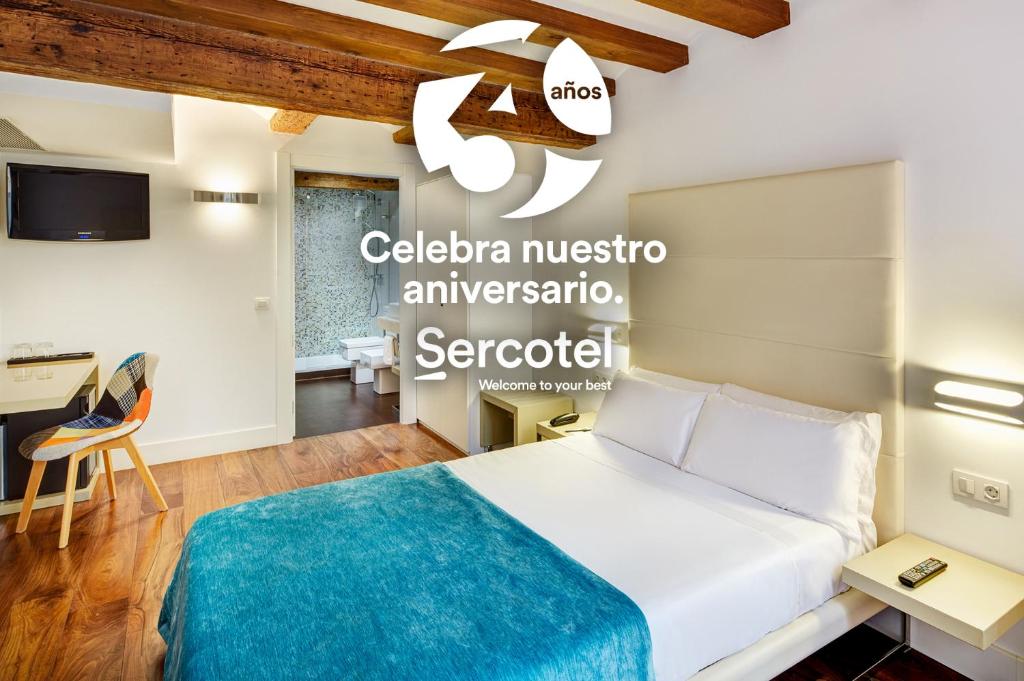 Llit o llits en una habitació de Sercotel Calle Mayor