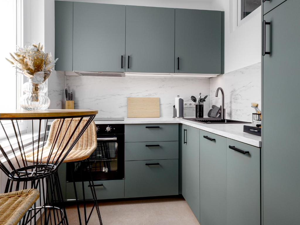 Una cocina o kitchenette en Design-Apartment in der Welser Innenstadt mit NETFLIX & Balkon