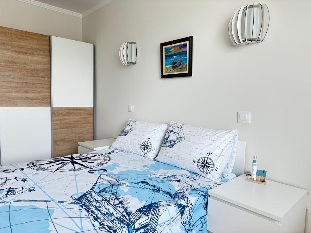 Кровать или кровати в номере Sea Garden 2BD