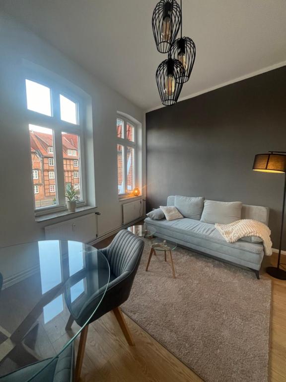 Säng eller sängar i ett rum på Zeitapartments Am Fischmarkt