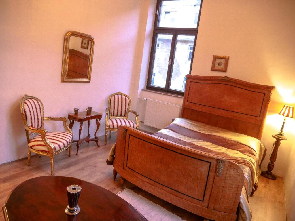 A bed or beds in a room at Villa Reim