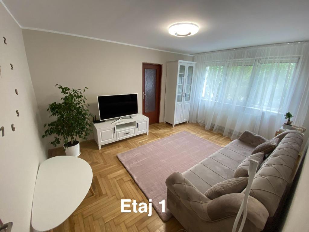 En TV eller et underholdningssystem på Apartament S26