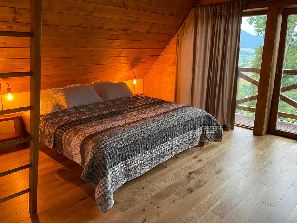 Una cama o camas en una habitación de Chalet Grúnik