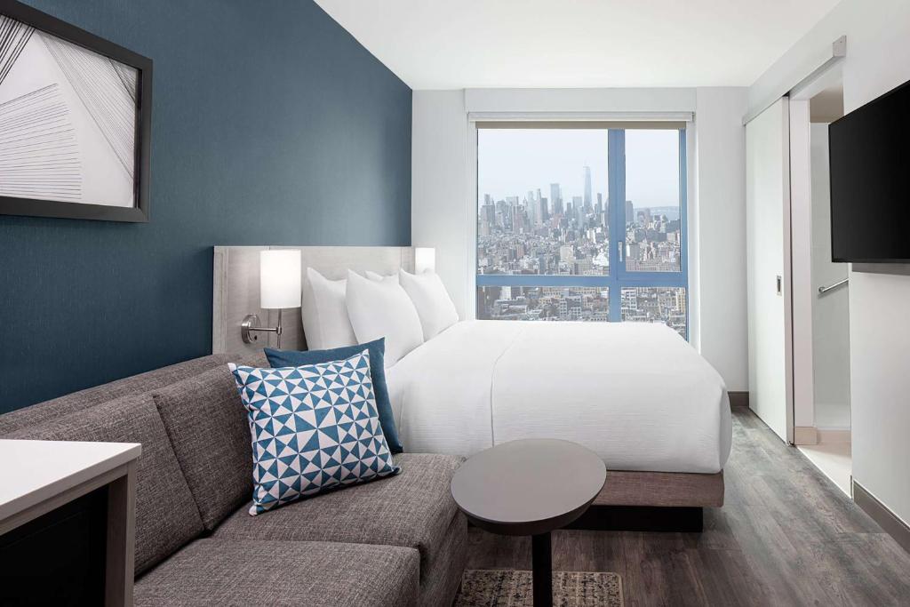 Ένα ή περισσότερα κρεβάτια σε δωμάτιο στο Hyatt Place New York Chelsea