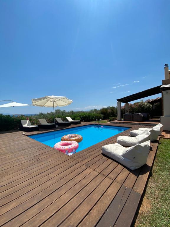 The swimming pool at or close to Georges Villa Galaxidi, family, pool and garden