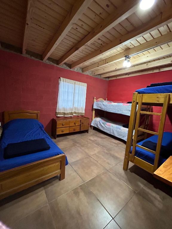 Una cama o camas en una habitación de Casa Tafi del Valle