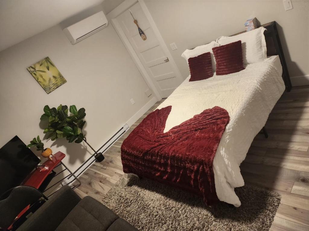 Choicest Cozy Stay tesisinde bir odada yatak veya yataklar