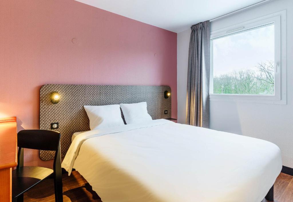 Katil atau katil-katil dalam bilik di B&B HOTEL Amneville-les-Thermes