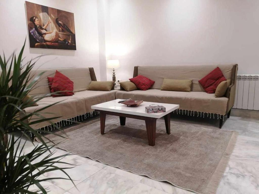 Area tempat duduk di Joli appartement coquet