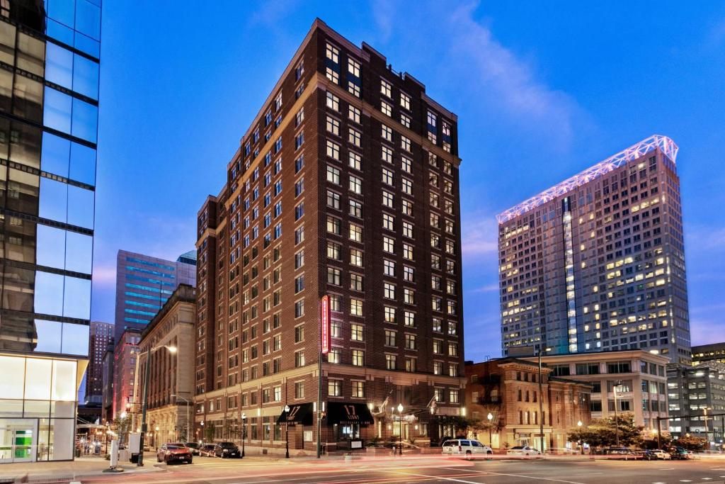 a tall building in a city at night at Residence Inn by Marriott Baltimore Downtown/ Inner Harbor in Baltimore