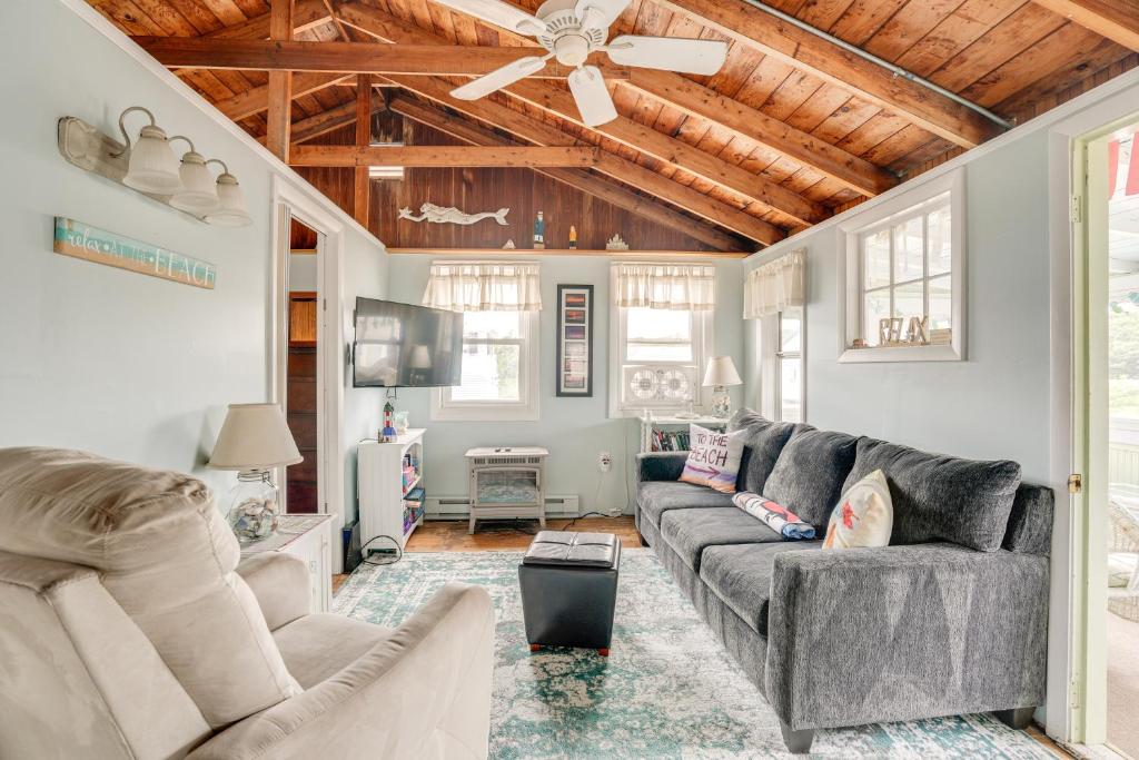 A seating area at Rockport Cottage with Patio - Steps to Beach!