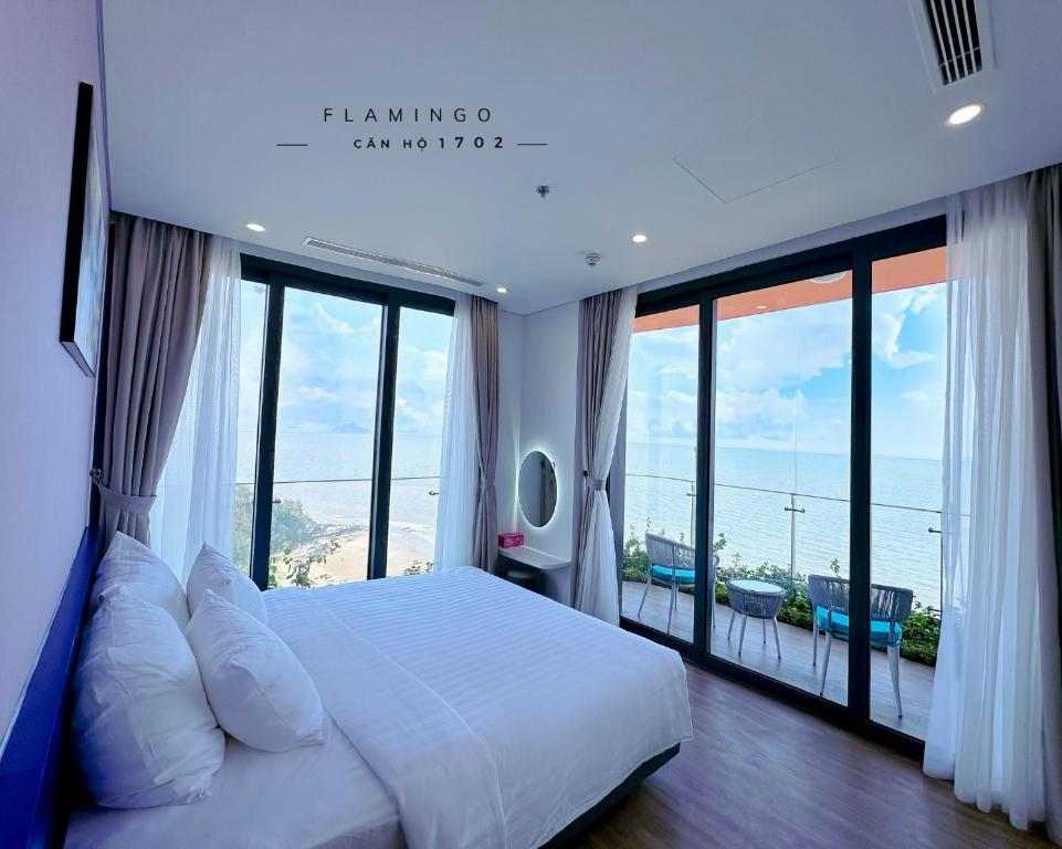 Легло или легла в стая в Flamingos Hải Tiến Ibiza 1702 - Deluxe room 61m, 2 phòng ngủ, view thẳng biển, ban công rộng