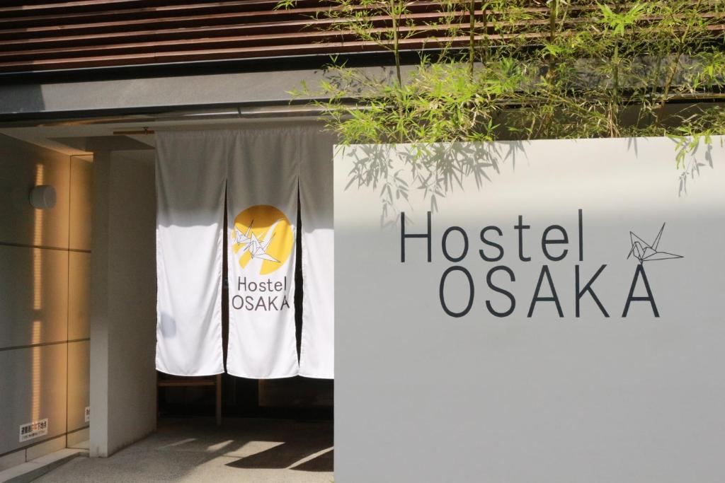 Palkinto, sertifikaatti, kyltti tai muu asiakirja, joka on esillä majoituspaikassa Hostel OSAKA