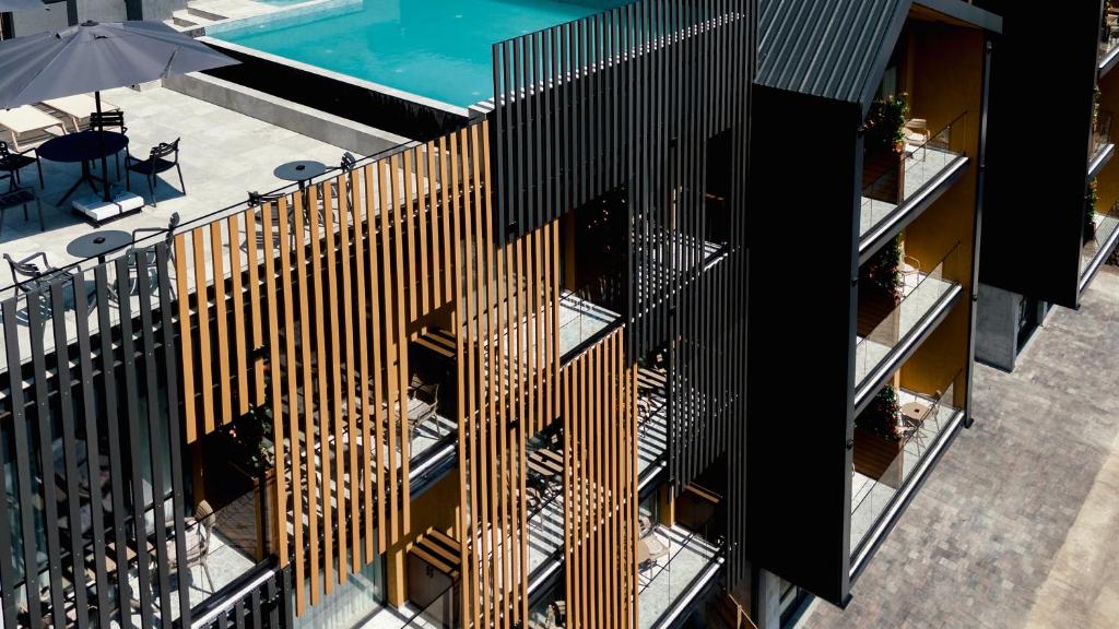 an overhead view of a building with a pool at Solridge Aparthotel in Tbilisi City