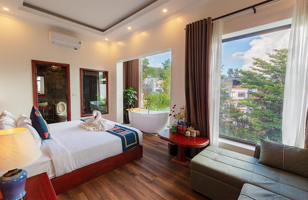 เตียงในห้องที่ Green Villa Sapa