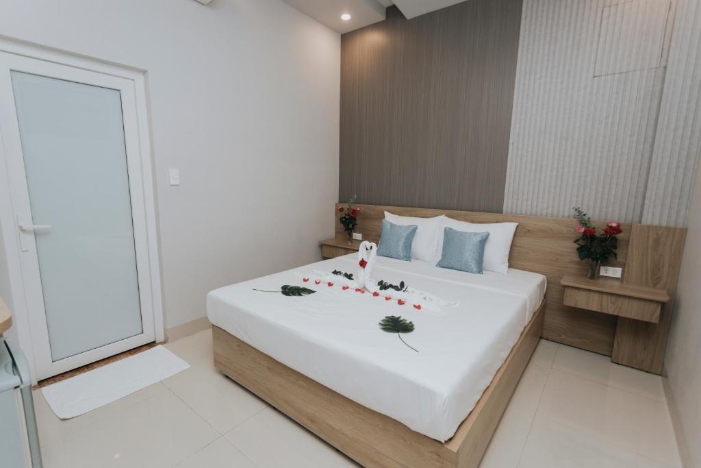 Voodi või voodid majutusasutuse Khoa Hotel Phan Thiết toas