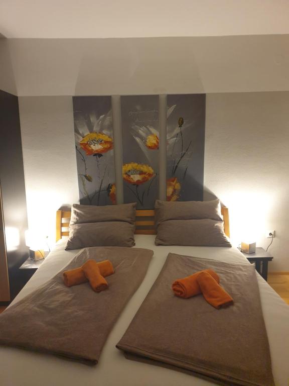 Rúm í herbergi á "Wohlfühl-Oase im Zentrum von Villach-1 Zimmer, Apartment , Garconniere Villach City