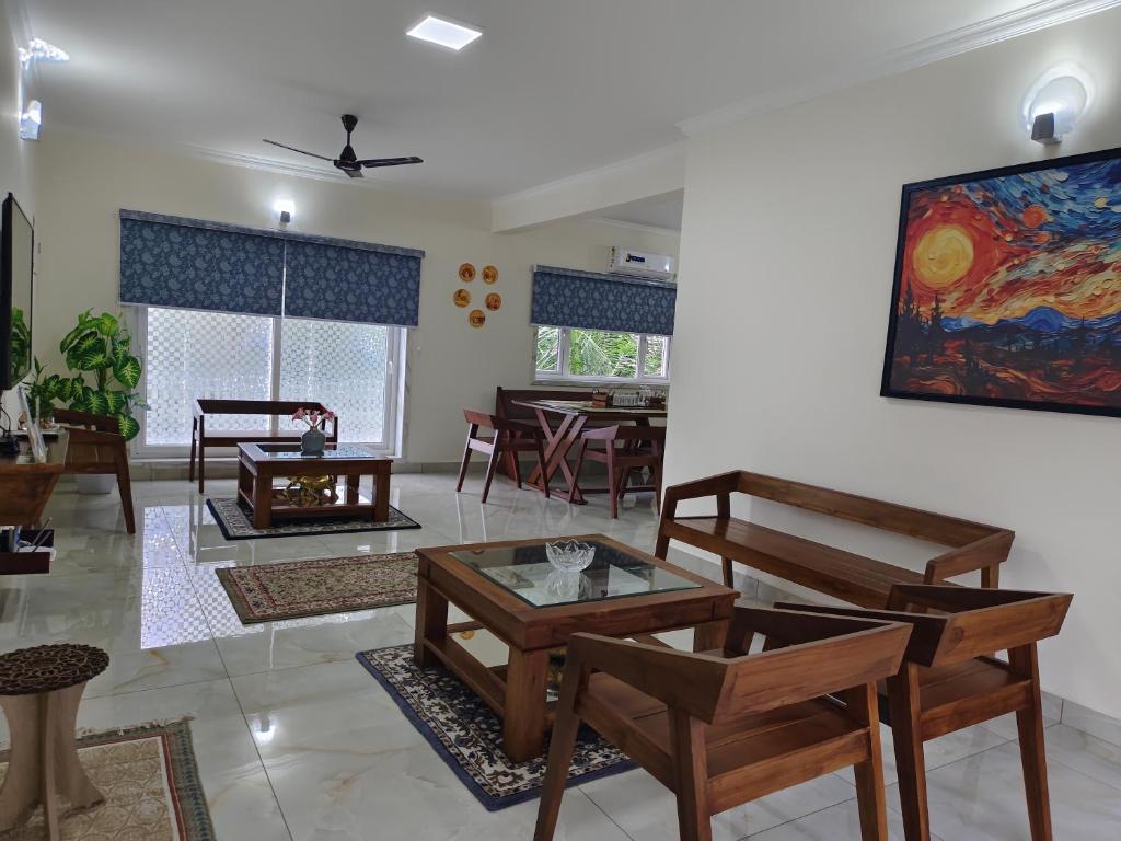 Uma área de estar em Onyx3, Best 3BHK Luxury Home Stay Thrissur - 7Elysee Homes